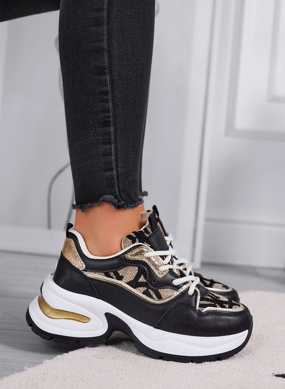 ENEA - Baskets noires et beiges avec motif monogramme et détails dorés