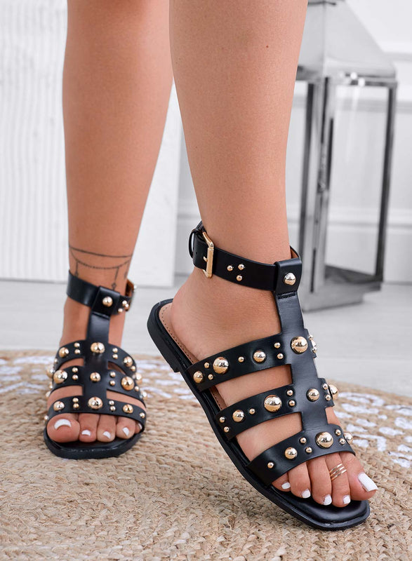 EULALIA - Sandales plates noires enveloppées de studs dorés