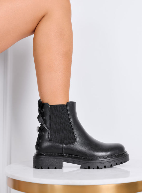 DANIELA - Bottines noires style militaire avec nœud et détails bijoux à l'arrière
