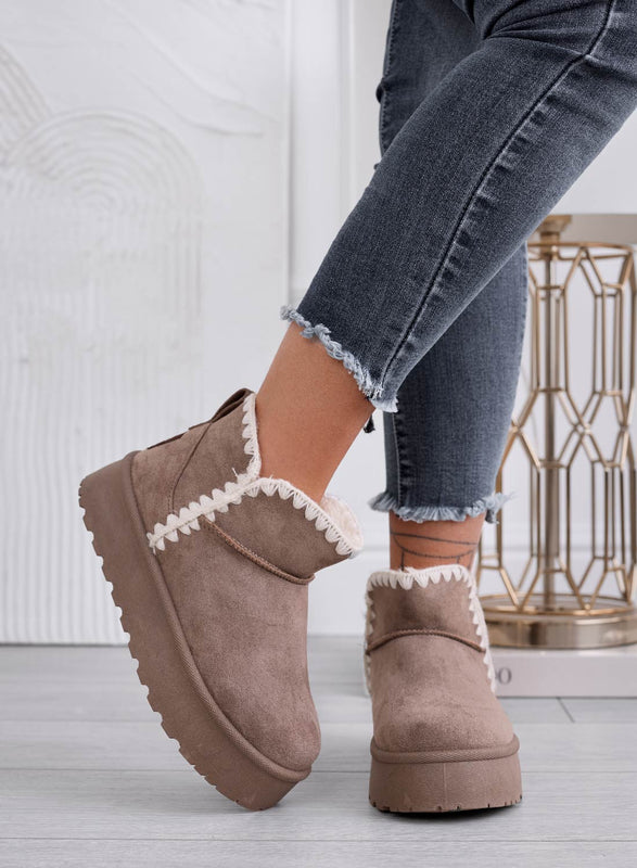 Bottines boue rembourrées avec bord brodé