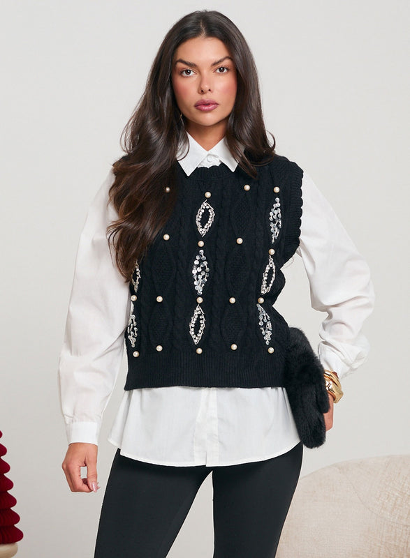 Black bootcut pants decorated with rhinestones