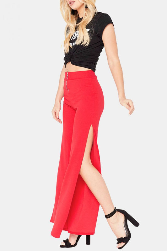 Pantalon rouge avec zip et fentes latérales