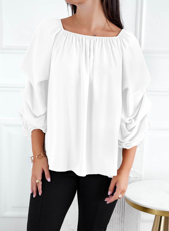 Blouse blanche à manches froncées