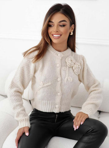 Cardigan en maille beige avec application florale