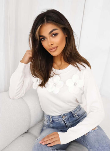 Chemise blanche avec fleurs appliquées