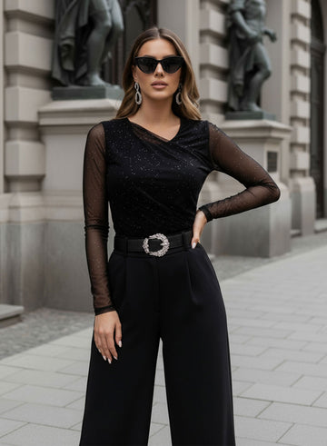Body negro con manga de tul y brillo