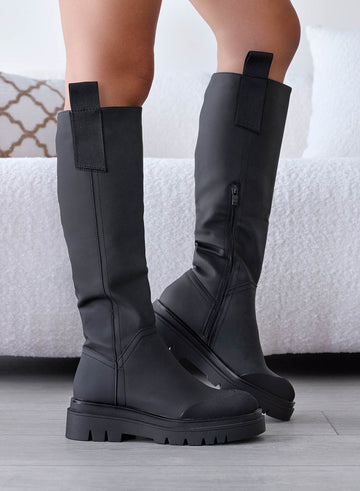 Bottes noires en tissu imperméable