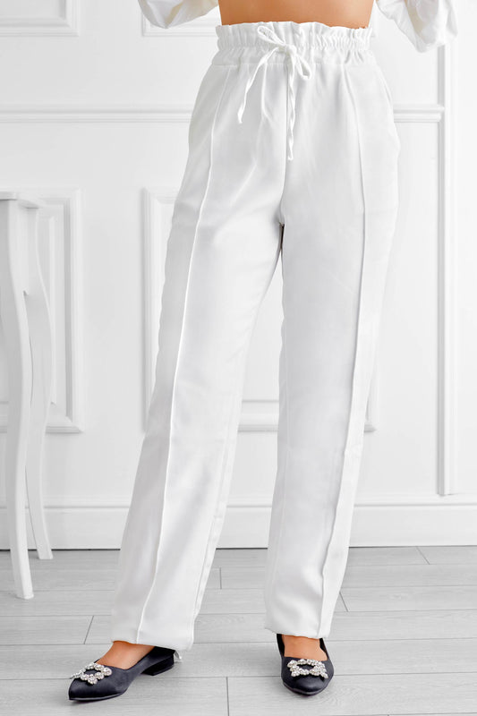 Pantalon blanc avec ressort et cordon de serrage à la taille