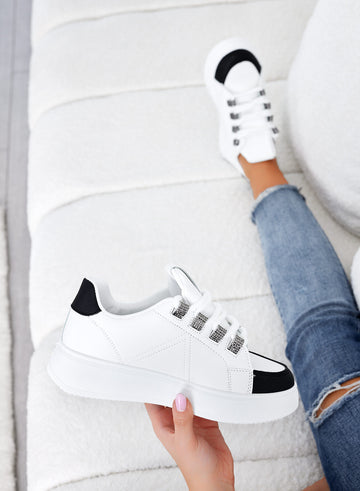 White and black sneakers with rhinestone inserts