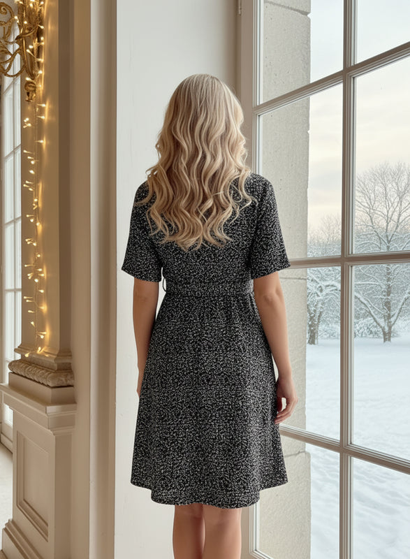 Abito argento in paillettes con cintura