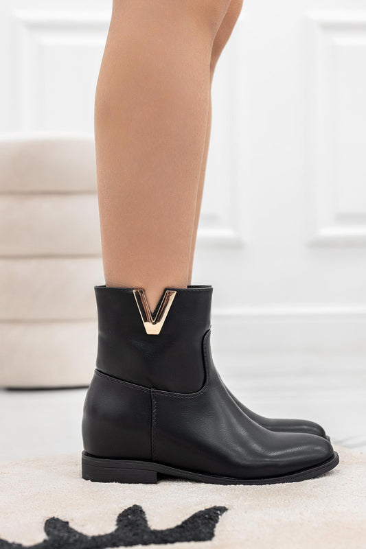 Bottines noires avec semelle compensée intérieure