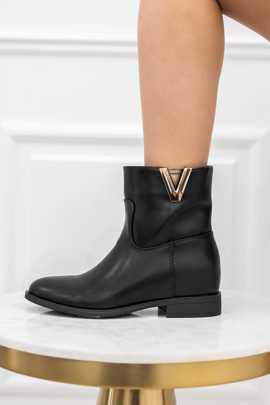 Bottines noires avec semelle compensée intérieure