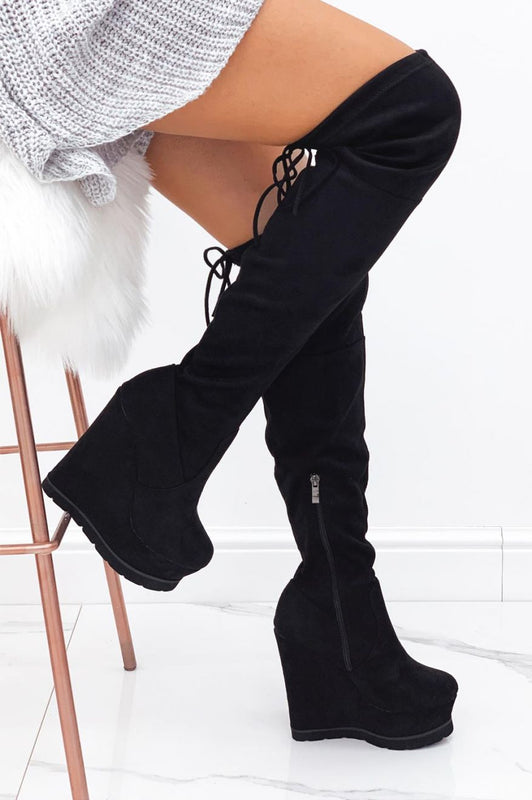 Cuissardes noires en daim avec semelle compensée