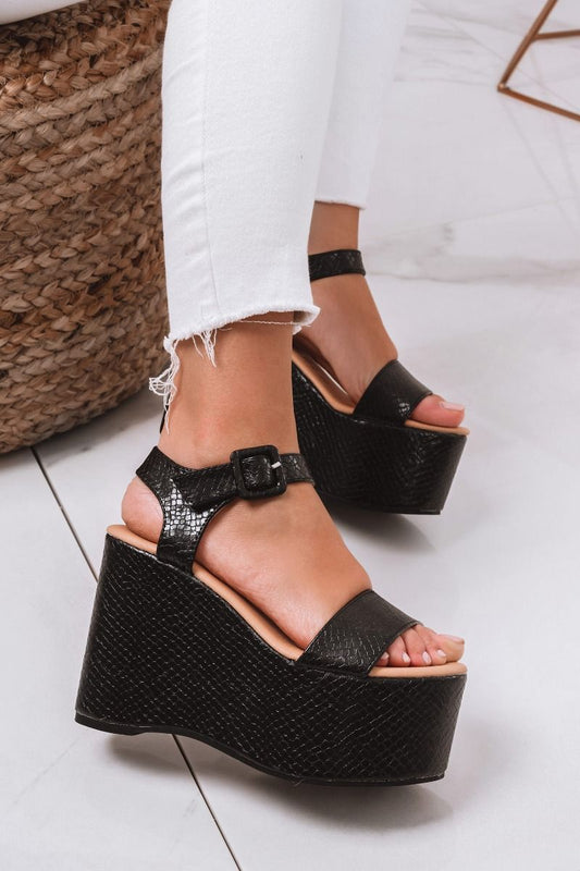 Black python-effect sandals with platform wedge