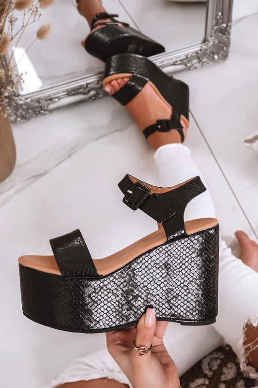 Black python-effect sandals with platform wedge