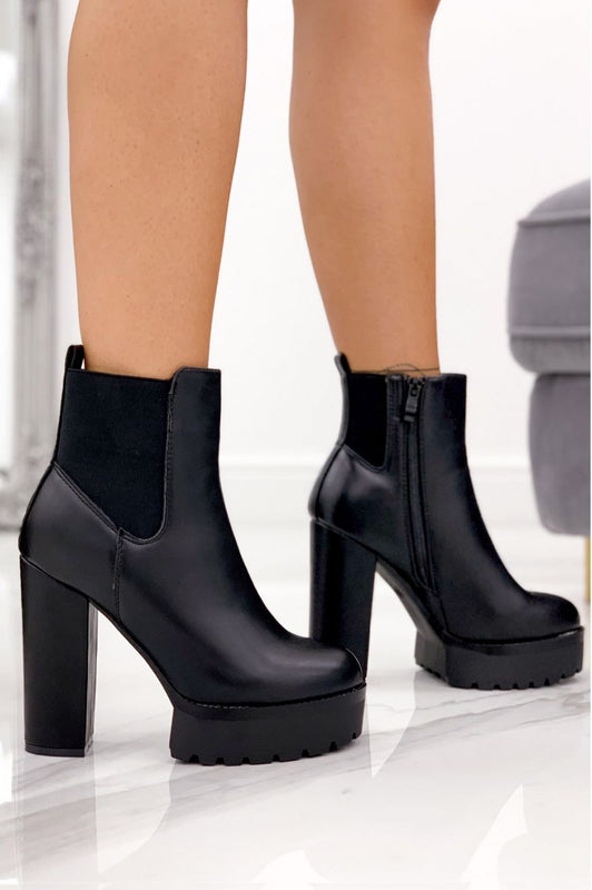 Black ankle boots with high heel and side elastic