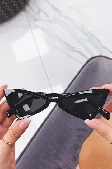 Lunettes de soleil noires œil de chat