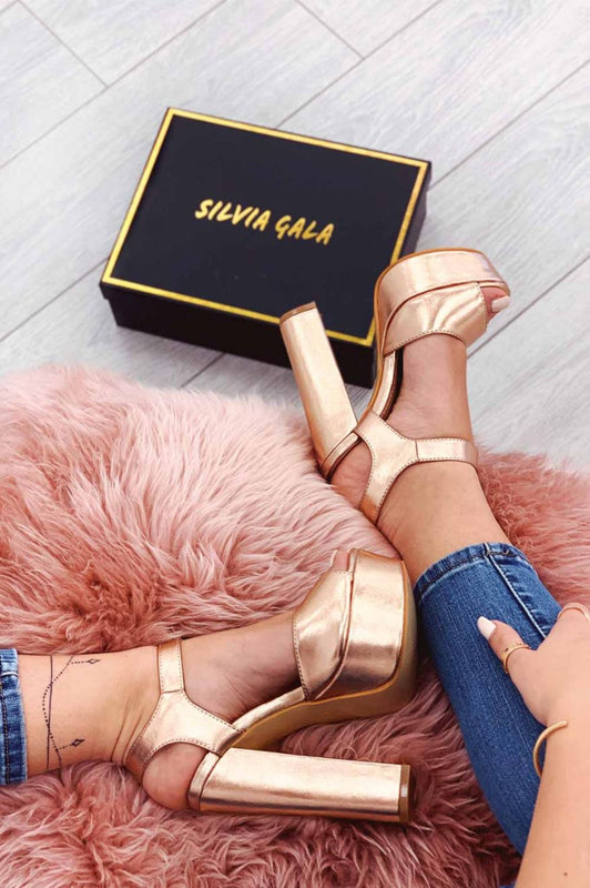 Metallic rose gold high-heeled sandals
