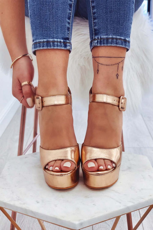 Metallic rose gold high-heeled sandals