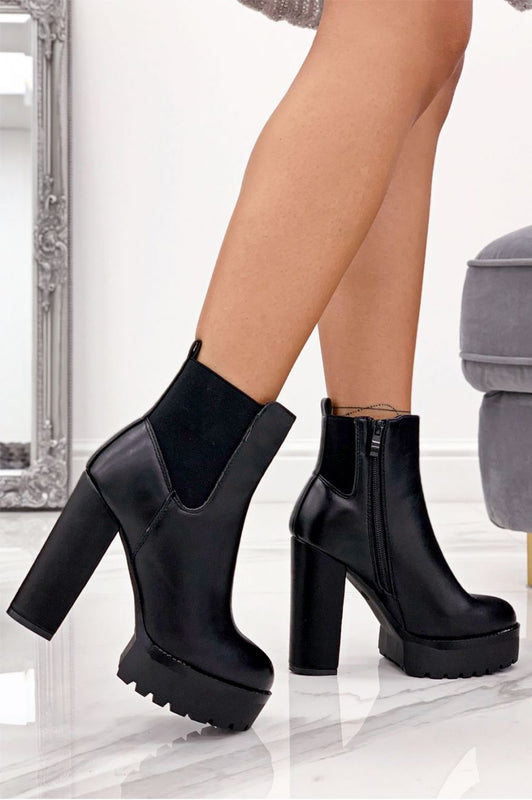 Black ankle boots with high heel and side elastic
