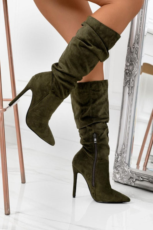 Green ruched ankle boots at calf height