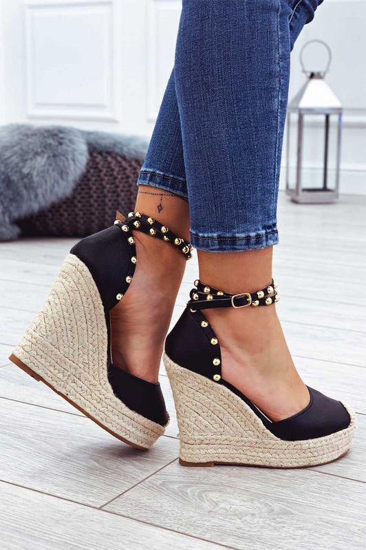 Espadrilles noires en similicuir avec semelle compensée haute et clous dorés