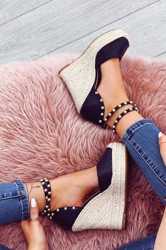 Espadrilles noires en similicuir avec semelle compensée haute et clous dorés