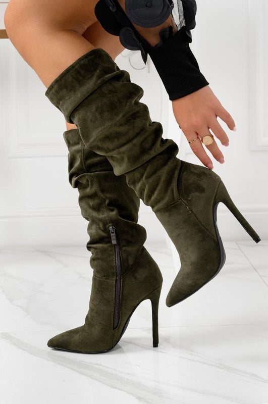 Green ruched ankle boots at calf height