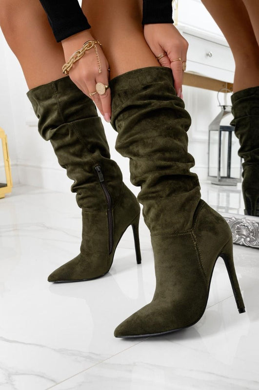 Green ruched ankle boots at calf height