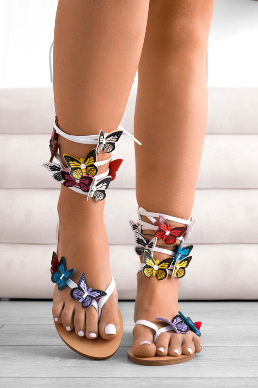 Sandales tongs plats blancs avec applications papillons