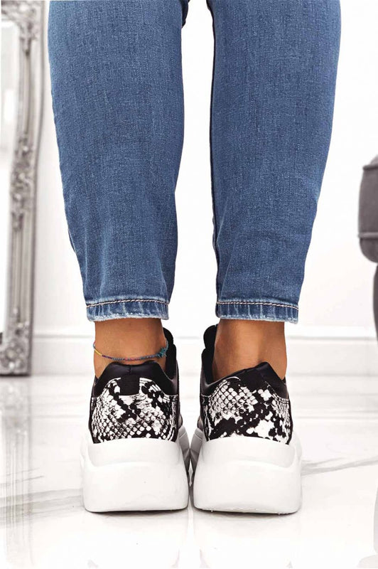Baskets noires avec empiècements effet python et lacets