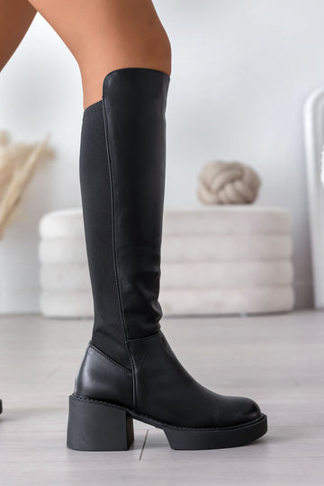 Black boots with elastic fabric on the back